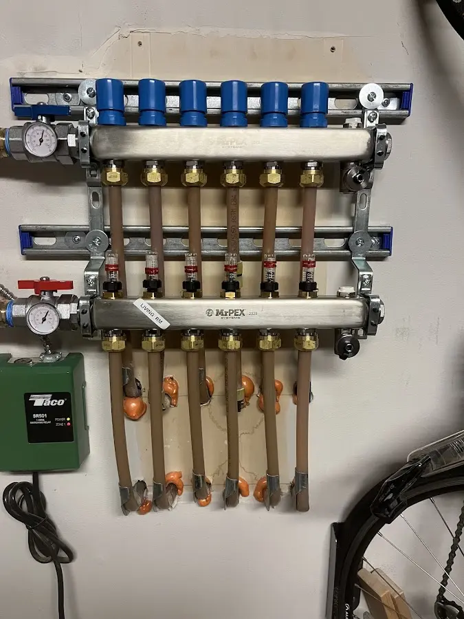 Plumber performing Gas Line Installation at a residential property in Garfield